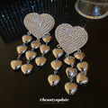 Crystal Heart Tassel Earrings in Polished Statement Design view 2