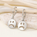 Frowning Face Huggie Drop Earrings in Gold and Silver Tone view 3