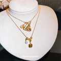 Gold Tone Oval Pearl Charm Necklaces With Decorative Accents view 1