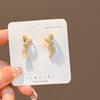 Pearl Bow Studs