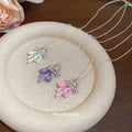 Pastel Flower and Butterfly Pendant Necklaces in Three Colors view 4