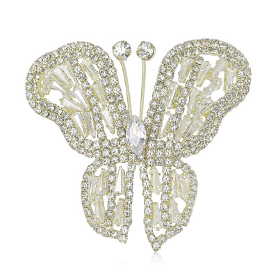 Front view of large clear crystal butterfly brooch against a white background.