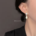 Silver Tone Clear Stone Top And Irregular White Pearl Stud Earrings view 2