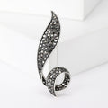 Curved Crystal Leaf Brooch In Black And Multicolor Finishes view 2