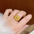 Gold Round Filigree Flower Disc Open Ring Red Center Stone view 2