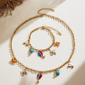 Travel Charm Necklace and Bracelet in Gold and Silver Tone view 1