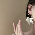 White Resin Flower Hoop Earrings With Gold Tone Hooks view 4