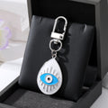 Gold and Silver Tone Enamel Teardrop Evil Eye Clip Keychains in Four Designs view 4