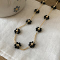 Black Flower Station Beaded Necklace with Gold Tone Links view 4
