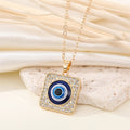 Gold Tone Square Crystal Halo Blue Evil Eye Pendant Necklace view 1