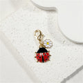 Gold Tone Daisy and Ladybug Lobster-Clasp Charms in Five Designs view 3