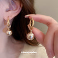 Gold Tone Textured Hoop Earrings With Large Pearl Drops view 1