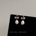Gold CZ Round Stud Bow Baroque White Pearl Drop Earrings view 3