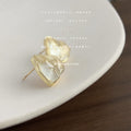 Gold Tone Irregular Translucent Cream Stone Like Stud Earrings view 3