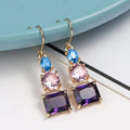 Gold Tone Purple Pink and Blue Geometric Drop Earrings view 1