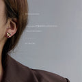 Gold Tone Matte Mini Four Petal Flower Stud Earrings For Women view 2
