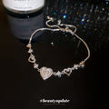 Silver Heart CZ Pull Adjustable Bracelet Shell Center view 4
