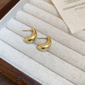 Sculptural Stud Earrings in Gold and Silver Tone Styles view 6