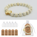 Ivory Wooden Bead Cross Bracelet With Silver-Tone Spacer Beads view 1
