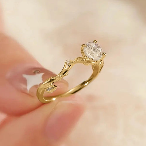 Second product view showing rose stem round clear solitaire ring