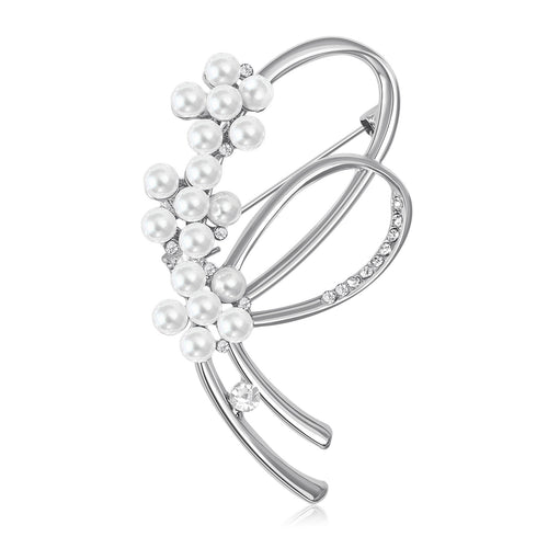 Silver pearl flower knot brooch on white background