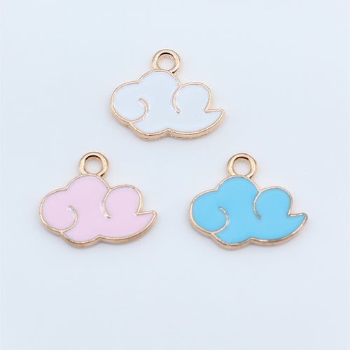 Styled view of enamel cloud charms in blue white and pink color options