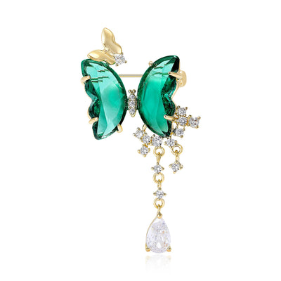 Green Butterfly Dangle Brooch shown alone on a light background