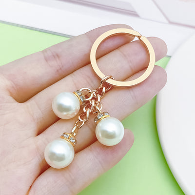 Image 1 showing headphone keychains shown in the product image.