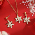 Gold Snowflake Enamel Necklace and Stud Earrings Set view 3