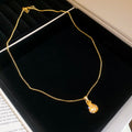 Gold Tone Heart Lock Pendant Necklace with Small Crystal Accents view 6