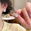Delicate Silver Tone Bow Stud Earrings with Clear Crystals view 6