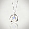 Silver Tone Orbital Pendant Necklace with Pearl Look Center view 2