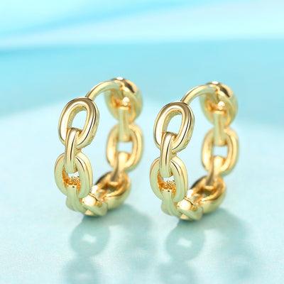 Front product view of gold tone chain link huggie hoop earrings with polished finish