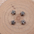 Six Petal Flower Spacer Beads in Antique Silver Metal view 2