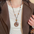 Black and Brown Cord Necklaces with Round Wood Look Pendants view 4