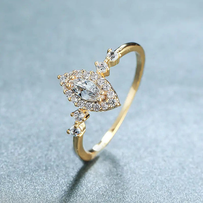 Marquise Halo Solitaire Side-Stone Ring In Polished Gold Tone