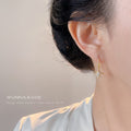 Gold-Tone CZ Starburst Star Drop Curved Hook Earrings view 2