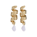 Sculpted Gold Pearl Drop Earrings in Polished Statement Design view 5