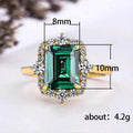 Emerald Green Rectangular Clear Stone Halo Ring In Gold Tone view 4