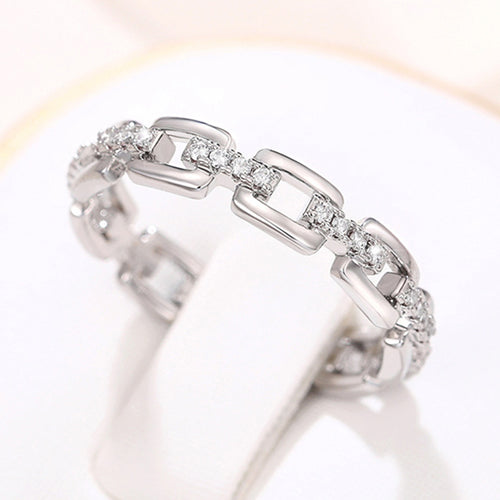 Product view showing rectangular link and clear stone eternity ring in silver tone