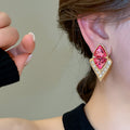Pink Diamond Shape Crystal Stud Earrings with Gold Tone Frames view 3