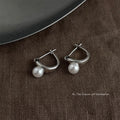 Silver Geometric Huggie Hoop Earrings White Pearl Accent view 3