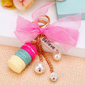 Stacked Macaron and Eiffel Tower Keychains with Braided Wrist Loops view 4