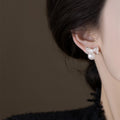 Silver Bow Pearl Stud Earrings with Crystal Accents view 4