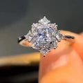 Emerald Cut Crystal Floral Halo Ring in Silver Tone view 1