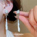 Fan and Teardrop Drop Ear Clips in Black and White Tones view 4