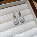Clear Crystal Stud Earrings With White Pearl Drops view 3