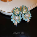 Blue Crystal and Pearl Cluster Statement Earrings with Polished Metal Accents view 2