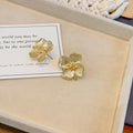 Translucent Gold Tone Four Petal Flower Statement Stud Earrings view 4