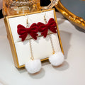 Burgundy Velvet Bow Gold Chain White Pom Pom Hook Earrings view 2